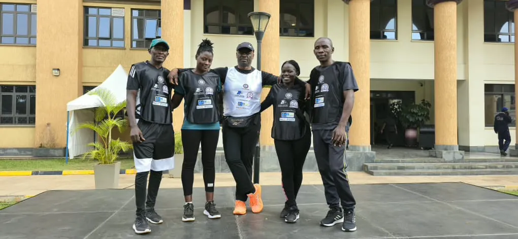 Coach Bob Ssebugwawo with the Bob Mazoezi facilitation team at the UJOA Wellness Day
